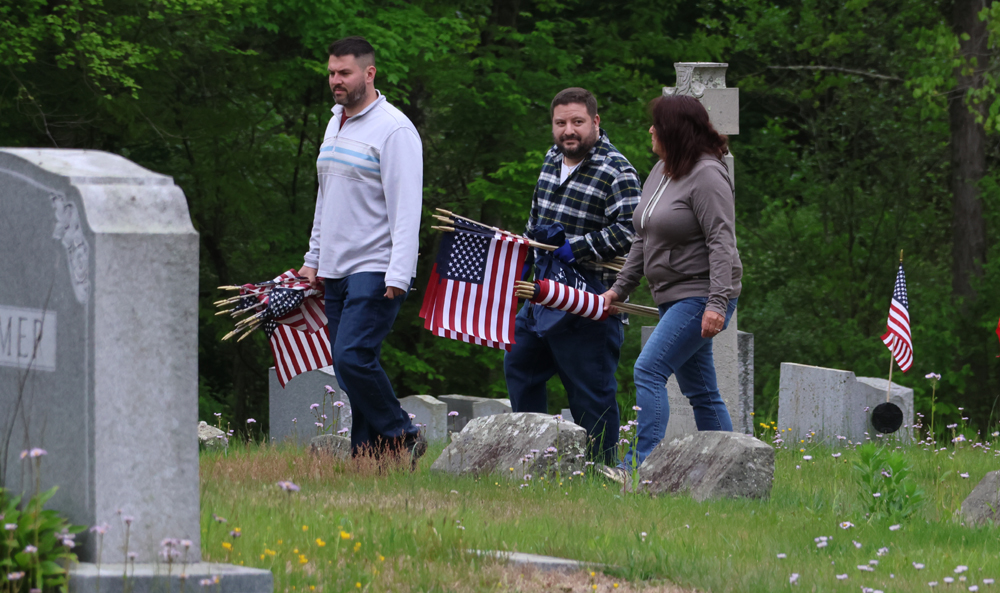 Flags placed, Sunday parades canceled