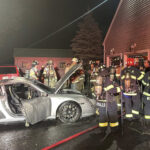 Garage fire damages two cars in Warren