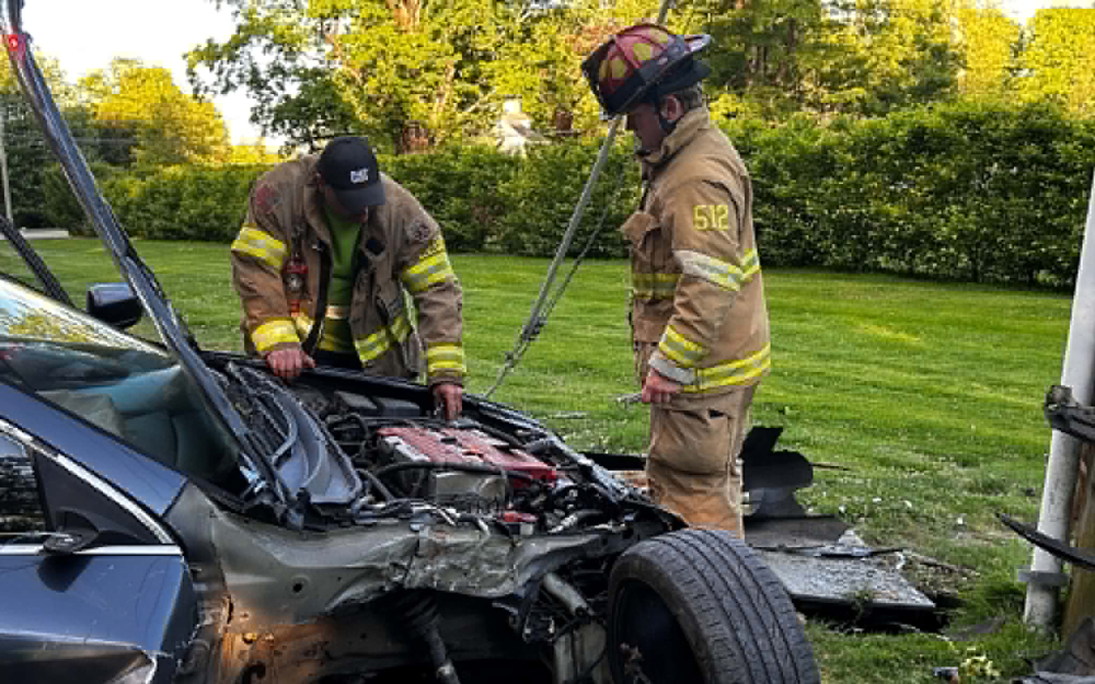 Car strikes utility pole on Prospect Street