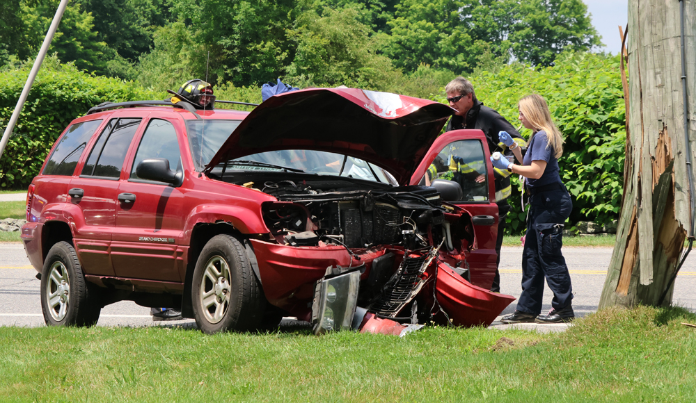 Driver injured in collision with pole