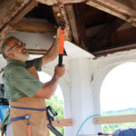 Pastor putting his carpenter skills to work