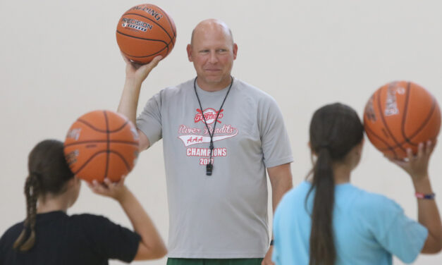 Hoop camp teaching girls the basics