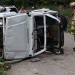 One hospitalized after dirt road crash