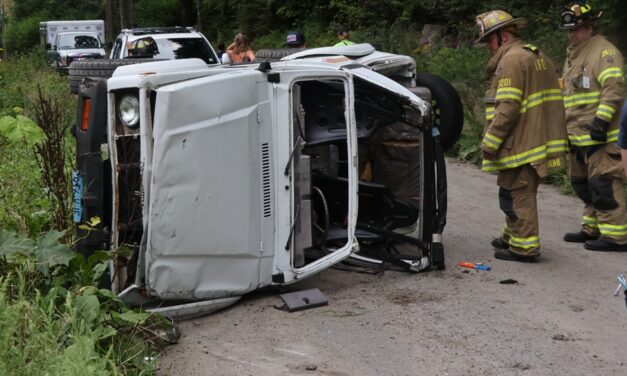 One hospitalized after dirt road crash